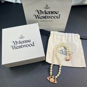 Vivienne Westwood Pearl Choker Necklace with Crystal Saturn Pendant